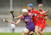 13 August 2011; Karen Atkinson, Wexford, in action against Joanne Casey, Cork. All-Ireland Senior Camogie Championship Semi-Final in association with RTE Sport, Cork v Wexford, Nowlan Park, Kilkenny. Picture credit: Pat Murphy / SPORTSFILE