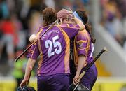 13 August 2011; Wexford's Evelyn Quigley, centre, Louise O'Leary, left, and Ciara O'Connor, right, celebrate after the game. All-Ireland Senior Camogie Championship Semi-Final in association with RTE Sport, Cork v Wexford, Nowlan Park, Kilkenny. Picture credit: Pat Murphy / SPORTSFILE