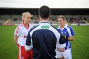 13 August 2011; Referee Sean Joy speaks to Tyrone captain Neamh Woods and Laois captain Grainne Dunne ahead of the game. TG4 All-Ireland Ladies Senior Football Championship Quarter-Final, Laois v Tyrone, St Brendan's Park, Birr, Co. Offaly. Picture credit: Stephen McCarthy / SPORTSFILE