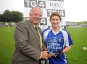 13 August 2011; Grace Weston, Laois, is presented with her Player of the Match award by Pat Quill, President, Cumann Peil Gael na mBan. TG4 All-Ireland Ladies Senior Football Championship Quarter-Final, Laois v Tyrone, St Brendan's Park, Birr, Co. Offaly. Picture credit: Stephen McCarthy / SPORTSFILE