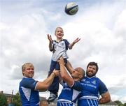 15 August 2011; Bank of Ireland are running a competition on Bluemagic.ie for the chance to be the mascot at one of the Bank of Ireland Pre-season series friendly games. In attendance at the launch of the competition are new Leinster signings, from left, Fionn Carr, Mat Berquist and Jamie Hagan with young Leinster supporter Cian McMahon, age 7, from Castleknock, Dublin. Donnybrook Stadium, Donnybrook, Dublin. Picture credit: Stephen McCarthy / SPORTSFILE