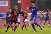 15 August 2011; John Heitinga, Everton, in action against Christy Fagan, Bohemians. Friendly Match, Bohemians v Everton, Dalymount Park, Dublin. Picture credit: Pat Murphy / SPORTSFILE