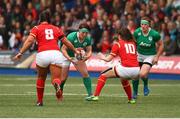 11 March 2017; Lindsay Peat of Ireland is tackled by Robyn Wilkins(10)and Shona Powell-Hughes of Wales during the RBS Women's Six Nations Rugby Championship match between Wales and Ireland at BT Sport Arms Park, Cardiff, Wales. Photo by Darren Griffiths/Sportsfile