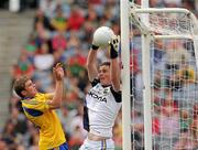 21 August 2011; The Tipperary goalkeeper Evan Comerford saves under pressure from Roscommon's Kevin Finn. GAA Football All-Ireland Minor Championship Semi-Final, Roscommon v Tipperary, Croke Park, Dublin. Picture credit: Ray McManus / SPORTSFILE