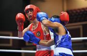 23 August 2011; Evan Metcalf, left, Ireland, exchanges punches with Kamran Malikov, Azerbaijan, during their 49kg bout. European Youth Boxing Championships, CityWest Convention Centre, CityWest Hotel, Saggart, Co. Dublin. Picture credit: Barry Cregg / SPORTSFILE