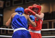 24 August 2011; George Bates, right, Ireland, exchanges punches with Radzhab Butaev, Russia, during their 56kg bout. European Youth Boxing Championships, CityWest Convention Centre, CityWest Hotel, Saggart, Co. Dublin. Picture credit: Barry Cregg / SPORTSFILE