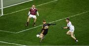 17 March 2017; Colm Cooper of Dr. Crokes shoots past goalkeeper Antoin McMullan and Paul McNeill of Slaughtneil to score a goal in the 20th minute  during the AIB GAA Football All-Ireland Senior Club Championship Final match between Dr. Crokes and Slaughtneil at Croke Park in Dublin. Photo by Ray McManus/Sportsfile