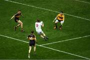 17 March 2017; Pádraig Cassidy , of Slaughtneil slips past Shane Murphy Michael Moloney, 3, and Luke Quinn of Dr. Crokes on his way to score a goal in the 13th minute during the AIB GAA Football All-Ireland Senior Club Championship Final match between Dr. Crokes and Slaughtneil at Croke Park in Dublin. Photo by Ray McManus/Sportsfile