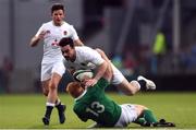 17 March 2017; Dominic Morris of England is tackled by Gavin Mullin of Ireland during the RBS U20 Six Nations Rugby Championship match between Ireland and England at Donnybrook Stadium in Donnybrook, Dublin. Photo by Eóin Noonan/Sportsfile