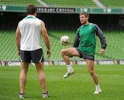 26 August 2011; Ireland's Ronan O'Gara with team-mate Sean O'Brien, left, during the Squad Captain's run ahead of their Rugby World Cup warm-up game against England on Saturday. Aviva Stadium, Lansdowne Road, Dublin. Picture credit: Pat Murphy / SPORTSFILE
