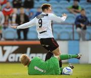 26 August 2011; Mark Quigley, Dundalk, attempts to go around Drogheda United goalkeeper Robert Duggan. FAI Ford Cup Fourth Round, Drogheda United v Dundalk, Hunky Dory Park, Drogheda, Co. Louth. Picture credit: Oliver McVeigh / SPORTSFILE