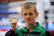 27 August 2011; Joe Fitzpatrick, Ireland, with his Bronze medal in the 56kg Bantamweight contest. European Youth Boxing Championships Finals, Citywest Hotel, Saggart, Co. Dublin. Picture credit: Oliver McVeigh / SPORTSFILE