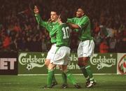 27 March 2002; Ian Harte of Republic of Ireland, left, celebrates with teammates Robbie Keane, 10, and Clinton Morrison after scoring a goal during the International Friendly match between Republic of Ireland and Denmark at Lansdowne Road in Dublin. Photo by David Maher/Sportsfile