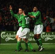 27 March 2002; Ian Harte of Republic of Ireland celebrates with team-mates Robbie Keane, 10, and Clinton Morrisson, right, after scoring his side's first goal during the International Friendly match between Republic of Ireland and Denmark at Lansdowne Road in Dublin. Photo by David Maher/Sportsfile