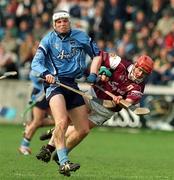 30 March 2002; Conal Keaney of Dublin in action against Ollie Canning of Galway during the Allianz Hurling League Division 1A Round 1 match between Dublin and Galway at Parnell Park in Dublin. Photo by Pat Murphy/Sportsfile