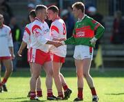 14 April 2002; James Nallen of Mayo shakes hands with Seamus McCallan of Tyrone after the Allianz National Football League Division 1 Semi-Final match between Mayo and Tyrone at Brewster Park in Enniskillen, Fermanagh. Photo by Damien Eagers/Sportsfile