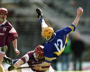 14 April 2002; Lar Corbett of Tipperary in action against Declan O'Brien of Galway during the Allianz National Hurling League Quarter-Final match between Galway and Tipperary at Semple Stadium in Thurles, Tipperary. Photo by Brendan Moran/Sportsfile