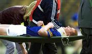 14 April 2002; Eamonn Corcoran of Tipperary leaves the field on a stretcher with a neck brace after receiving an injury during the Allianz National Hurling League Quarter-Final match between Galway and Tipperary at Semple Stadium in Thurles, Tipperary. Photo by Brendan Moran/Sportsfile