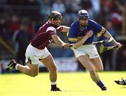 14 April 2002; John O'Brien of Tipperary in action against Michael Healy of Galway during the Allianz National Hurling League Quarter-Final match between Galway and Tipperary at Semple Stadium in Thurles, Tipperary. Photo by Brendan Moran/Sportsfile