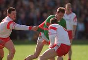 14 April 2002; James Nallen of Mayo in action against Conor Gormley, left, and Cormac McAnallen of Tyrone during the Allianz National Football League Division 1 Semi-Final match between Mayo and Tyrone at Brewster Park in Enniskillen, Fermanagh. Photo by Damien Eagers/Sportsfile