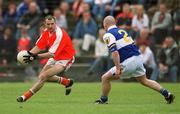 14 April 2002; Steven McDonnell of Armagh in action against Patrick Leonard of Laois during the Allianz National Football League Division 2 Semi-Final match between Armagh and Laois at Pearse Park in Longford. Photo by Ray McManus/Sportsfile