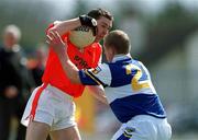14 April 2002; Oisín McConville of Armagh in action against David Brennan of Laois during the Allianz National Football League Division 2 Semi-Final match between Armagh and Laois at Pearse Park in Longford. Photo by Ray McManus/Sportsfile