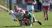 14 April 2002; Cormac McAnallen of Tyrone in action against James Nallen of Mayo during the Allianz National Football League Division 1 Semi-Final match between Mayo and Tyrone at Brewster Park in Enniskillen, Fermanagh. Photo by Damien Eagers/Sportsfile