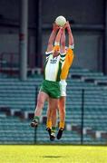 14 April 2002; Darragh Ó Sé of Kerry is tackled in the air from Nigel Crawford of Meath during the Allianz National Football League Division 2 Semi-Final match between Meath and Kerry at the Gaelic Grounds in Limerick. Photo by Matt Browne/Sportsfile