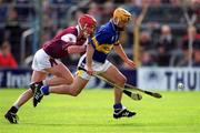 14 April 2002; Liam Cahill of Tipperary in action against Ollie Canning of Galway during the Allianz National Hurling League Quarter-Final match between Galway and Tipperary at Semple Stadium in Thurles, Tipperary. Photo by Brendan Moran/Sportsfile