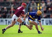 14 April 2002; Liam Cahill of Tipperary in action against Ollie Canning of Galway during the Allianz National Hurling League Quarter-Final match between Galway and Tipperary at Semple Stadium in Thurles, Tipperary. Photo by Brendan Moran/Sportsfile