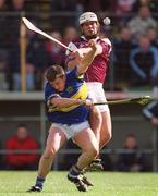 14 April 2002; Noel Morris of Tipperary in action against David Tierney of Galway during the Allianz National Hurling League Quarter-Final match between Galway and Tipperary at Semple Stadium in Thurles, Tipperary. Photo by Brendan Moran/Sportsfile