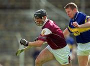 14 April 2002; Cathal Moore of Galway in action against Tipperary's Conor Gleeson during the Allianz National Hurling League Quarter-Final match between Galway and Tipperary at Semple Stadium in Thurles, Tipperary. Photo by Brendan Moran/Sportsfile