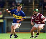14 April 2002; Noel Morris of Tipperary in action against Fergal Healy of Galway during the Allianz National Hurling League Quarter-Final match between Galway and Tipperary at Semple Stadium in Thurles, Tipperary. Photo by Brendan Moran/Sportsfile