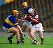 14 April 2002; Niall Hayes of Galway in action against Eamonn Corcoran, left and Conor Gleeson of Tipperary during the Allianz National Hurling League Quarter-Final match between Galway and Tipperary at Semple Stadium in Thurles, Tipperary. Photo by Brendan Moran/Sportsfile