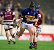 14 April 2002; Philip Maher of Tipperary in action against Damien Hayes of Galway during the Allianz National Hurling League Quarter-Final match between Galway and Tipperary at Semple Stadium in Thurles, Tipperary. Photo by Brendan Moran/Sportsfile