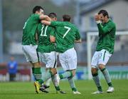 1 September 2011; Robert Brady, centre, Republic of Ireland, celebrates with team-mates Aidan White, 7, Richard Towell, left, and Gavin Gunning, far right, after scoring his side's first goal. UEFA Under 21 European Championship 2013 Qualification, Republic of Ireland v Hungary, The Showgrounds, Sligo. Picture credit: Barry Cregg / SPORTSFILE