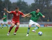 1 September 2011; Aidan White, Republic of Ireland, in action against Mate Kiss, Hungary. UEFA Under 21 European Championship 2013 Qualification, Republic of Ireland v Hungary, The Showgrounds, Sligo. Picture credit: Barry Cregg / SPORTSFILE