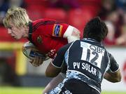 9 September 2011; Danny Barnes, Munster, is tackled by Troy Nathan, Warriors. Celtic League, Glasgow Warriors v Munster, Firhill Arena, Glasgow, Scotland. Picture credit: Craig Watson / SPORTSFILE