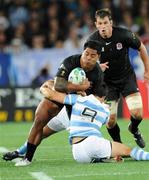 10 September 2011; Manu Tuilagi, England, is tackled by Niclolas Vergallo, Argentina. 2011 Rugby World Cup, Pool B, England v Argentina, Otago Stadium, Dunedin, New Zealand. Picture credit: Ross Setford / SPORTSFILE