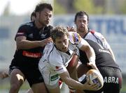 10 September 2011; Darren Cave, Ulster, is tackled by Nick Williams, Aironi. Celtic League, Aironi v Ulster, Stadio Luigi Zaffanella, Viadana, Italy. Picture credit: Roberto Bregani / SPORTSFILE