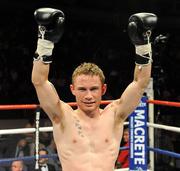 10 September 2011; Carl Frampton celebrates after winning the vacant Commonwealth Super Bantamweight title. WBA World Light-Welterweight Championship Eliminator, Undercard, Carl Frampton v Mark Quon, Odyssey Arena, Belfast, Co. Antrim. Picture credit: Oliver McVeigh / SPORTSFILE