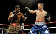 10 September 2011; Paul McCloskey, right, exchanges punches with Breidis Prescott during their WBA World Light-Welterweight Championship Eliminator bout. Odyssey Arena, Belfast, Co. Antrim. Picture credit: Oliver McVeigh / SPORTSFILE