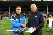 10 September 2011; Ger Cunningham, Sports Sponsorship Manager, Bord Gais, right, with Johnny McCaffrey, Lucan Sarsfields GAA Club, Dublin, after he won the now famous Bord Gáis Energy Crossbar Challenge at half-time during the Bord Gáis Energy GAA Hurling Under 21 All-Ireland 'A' Championship Final between Galway and Dublin. Semple Stadium, Thurles, Co. Tipperary. Picture credit: Ray McManus / SPORTSFILE