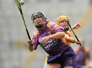 11 September 2011; Colleen Atkinson, Wexford, in action against Louise McAleese, Antrim. All-Ireland Intermediate Camogie Championship Final in association with RTE Sport, Antrim v Wexford, Croke Park, Dublin. Picture credit: Brian Lawless / SPORTSFILE