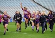 11 September 2011; Wexford players Kate Kelly, left, and captain Ursula Jacob, hold the O'Duffy cup at the of the game, after they celebrate with their team-mates. All-Ireland Senior Camogie Championship Final in association with RTE Sport, Galway v Wexford, Croke Park, Dublin. Picture credit: David Maher / SPORTSFILE