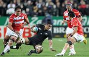 16 September 2011; New Zealand's Jerome Kaino is closed down by Japan's Hitoshi Ono. 2011 Rugby World Cup, Pool A, New Zealand v Japan, Waikato Stadium, Hamilton, New Zealand. Picture credit: David Rowland / SPORTSFILE