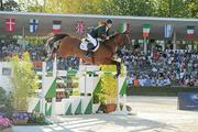 16 September 2011; Denis Lynch, from Tipperary Town, Co. Tipperary, and Lantinus while competing in the third day's event at the FEI European Jumping Championships, Club de Campo Villa, Madrid, Spain. Picture credit: Ray McManus / SPORTSFILE