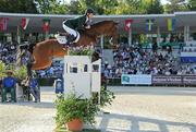 16 September 2011; Denis Lynch, from Tipperary Town, Co. Tipperary, and Lantinus while competing in third day's event at the FEI European Jumping Championships, Club de Campo Villa, Madrid, Spain. Picture credit: Ray McManus / SPORTSFILE