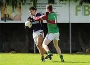 17 September 2011; Mark Coughlan, Kilmacud Crokes, Dublin, in action against Barry McGoldrick, Colraine, Derry, right, during their quarter-final game. Blue September Kilmacud Crokes All Ireland Football 7s 2011. Kilmacud Crokes GAA Club, Stillorgan, Dublin. Picture credit: Pat Murphy / SPORTSFILE