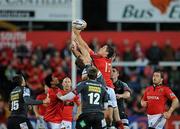 17 September 2011; Tom Gleeson, Munster, is tackled by Andy Fenby and Gareth Maule,12, Scarlets, Celtic League, Munster v Scarlets, Musgrave Park, Cork. Picture credit: Matt Browne / SPORTSFILE